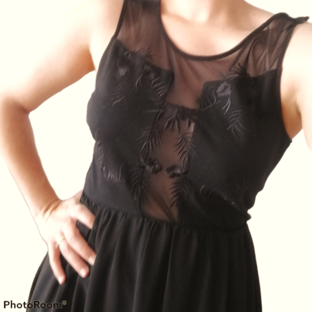 Black dress with mesh panelling